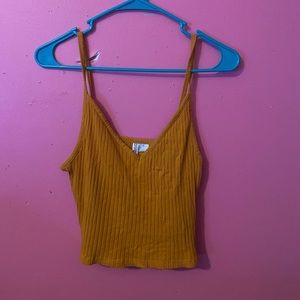 Mustard yellow tank top crop top, super comfy , confident.